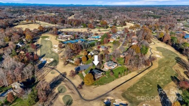 Live all on one level if desired. This home overlooks the 17th on Rock Barn Golf and Spa in North Carolina - for sale on GolfHomes.com, golf home, golf lot