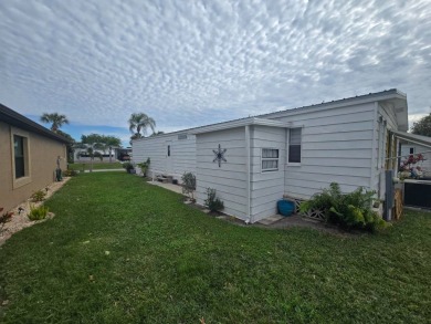 Discover this fully furnished home on the 8th Green, offering on Spanish Lakes Country Club in Florida - for sale on GolfHomes.com, golf home, golf lot