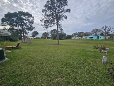 Discover this fully furnished home on the 8th Green, offering on Spanish Lakes Country Club in Florida - for sale on GolfHomes.com, golf home, golf lot