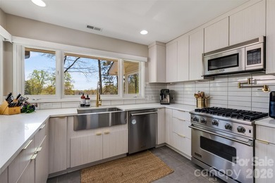 Welcome to 6 Pine Knoll Drive, a beautifully updated MCM ranch on River Hills Country Club in South Carolina - for sale on GolfHomes.com, golf home, golf lot