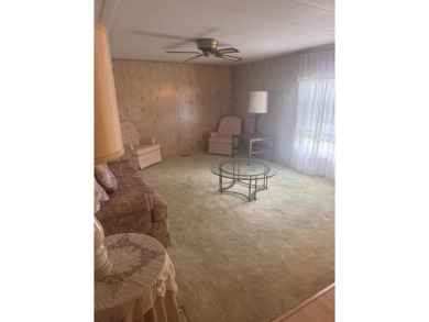 Live the Florida lifestyle in this beautifully maintained 2-bed on Spanish Lakes Golf Village in Florida - for sale on GolfHomes.com, golf home, golf lot