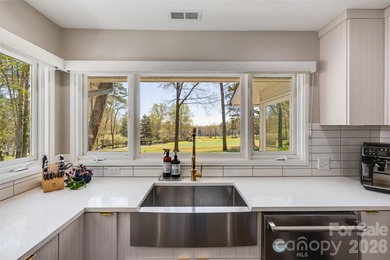 Welcome to 6 Pine Knoll Drive, a beautifully updated MCM ranch on River Hills Country Club in South Carolina - for sale on GolfHomes.com, golf home, golf lot