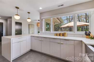 Welcome to 6 Pine Knoll Drive, a beautifully updated MCM ranch on River Hills Country Club in South Carolina - for sale on GolfHomes.com, golf home, golf lot