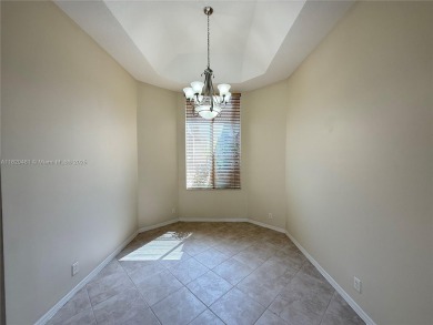 Gorgeous single-story Mediterranean-style pool home in the gated on TPC Eagle Trace in Florida - for sale on GolfHomes.com, golf home, golf lot