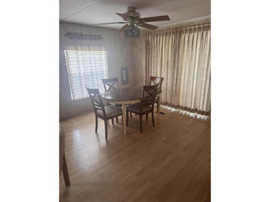 Live the Florida lifestyle in this beautifully maintained 2-bed on Spanish Lakes Golf Village in Florida - for sale on GolfHomes.com, golf home, golf lot