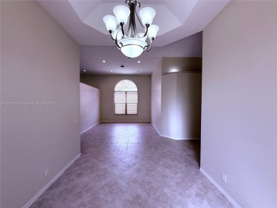 Gorgeous single-story Mediterranean-style pool home in the gated on TPC Eagle Trace in Florida - for sale on GolfHomes.com, golf home, golf lot