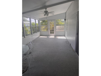 Live the Florida lifestyle in this beautifully maintained 2-bed on Spanish Lakes Golf Village in Florida - for sale on GolfHomes.com, golf home, golf lot