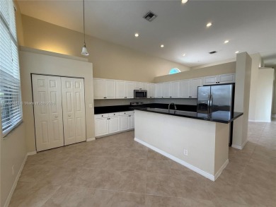 Gorgeous single-story Mediterranean-style pool home in the gated on TPC Eagle Trace in Florida - for sale on GolfHomes.com, golf home, golf lot