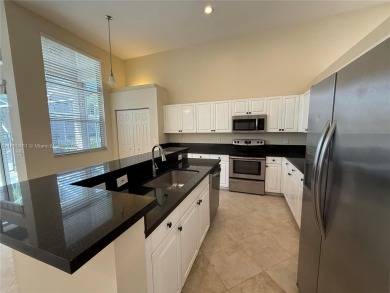 Gorgeous single-story Mediterranean-style pool home in the gated on TPC Eagle Trace in Florida - for sale on GolfHomes.com, golf home, golf lot