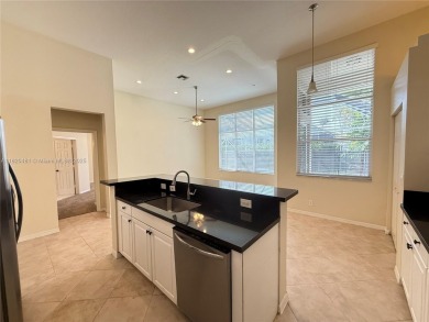 Gorgeous single-story Mediterranean-style pool home in the gated on TPC Eagle Trace in Florida - for sale on GolfHomes.com, golf home, golf lot