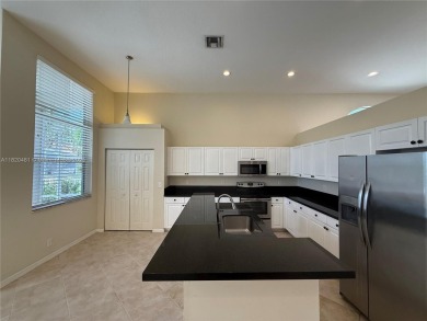 Gorgeous single-story Mediterranean-style pool home in the gated on TPC Eagle Trace in Florida - for sale on GolfHomes.com, golf home, golf lot