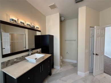Gorgeous single-story Mediterranean-style pool home in the gated on TPC Eagle Trace in Florida - for sale on GolfHomes.com, golf home, golf lot