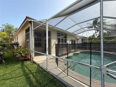 Gorgeous single-story Mediterranean-style pool home in the gated on TPC Eagle Trace in Florida - for sale on GolfHomes.com, golf home, golf lot