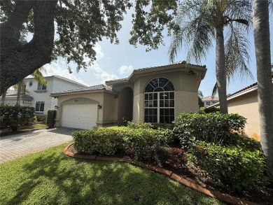 Gorgeous single-story Mediterranean-style pool home in the gated on TPC Eagle Trace in Florida - for sale on GolfHomes.com, golf home, golf lot