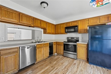 Beautifully maintained brick townhome in the highly sought-after on Cypress Point Country Club in Virginia - for sale on GolfHomes.com, golf home, golf lot