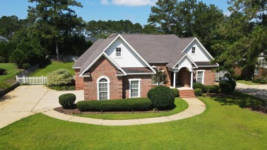 Nestled within the prestigious Robert Trent Jones Golf Course on Highland Oaks Golf Course in Alabama - for sale on GolfHomes.com, golf home, golf lot