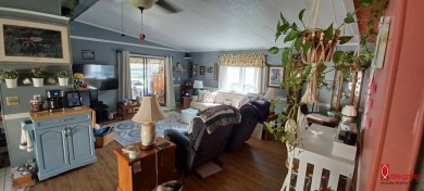 Come settle down and relax in a beautiful manufactured home with on Fairways Country Club in Florida - for sale on GolfHomes.com, golf home, golf lot