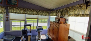 Come settle down and relax in a beautiful manufactured home with on Fairways Country Club in Florida - for sale on GolfHomes.com, golf home, golf lot