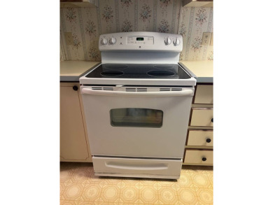 Take a look at this charming and spacious partially furnished on Lake Henry Golf Club in Florida - for sale on GolfHomes.com, golf home, golf lot