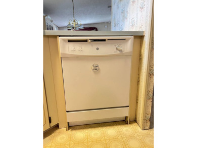 Take a look at this charming and spacious partially furnished on Lake Henry Golf Club in Florida - for sale on GolfHomes.com, golf home, golf lot
