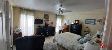 Come settle down and relax in a beautiful manufactured home with on Fairways Country Club in Florida - for sale on GolfHomes.com, golf home, golf lot