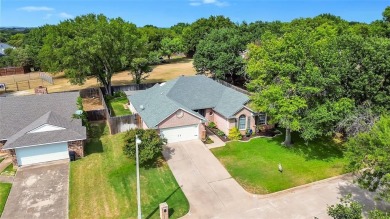 Step inside your dream home: a charming single-level on Trophy Club of Dallas in Texas - for sale on GolfHomes.com, golf home, golf lot