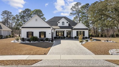 Luxurious custom built craftsman style home located in desirable on Wild Wing Plantation in South Carolina - for sale on GolfHomes.com, golf home, golf lot