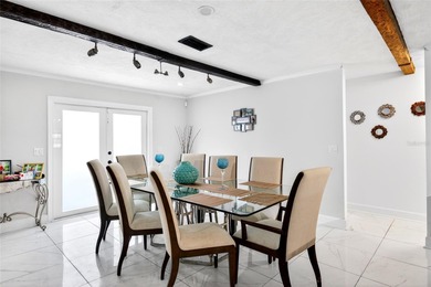 Modern sophistication in historic Fort King District sitting on on The Golf Club of Ocala in Florida - for sale on GolfHomes.com, golf home, golf lot