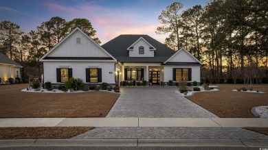 Luxurious custom built craftsman style home located in desirable on Wild Wing Plantation in South Carolina - for sale on GolfHomes.com, golf home, golf lot