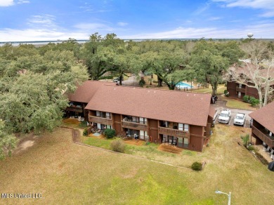 Discover the charm of this inviting 1-bedroom, 1-bath upstairs on Diamondhead Country Club in Mississippi - for sale on GolfHomes.com, golf home, golf lot