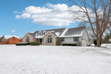 Located on a serene half-acre lot overlooking the South Course on Evergreen Golf Club in Wisconsin - for sale on GolfHomes.com, golf home, golf lot