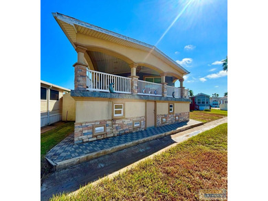 Golf course beauty with huge windows framing stunning views on Long Island Golf Course in Texas - for sale on GolfHomes.com, golf home, golf lot