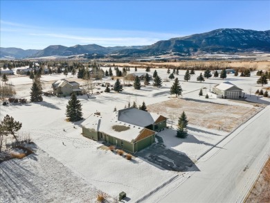 Stunning contemporary Craftsman-style home nestled in a tranquil on Red Lodge Golf Club in Montana - for sale on GolfHomes.com, golf home, golf lot