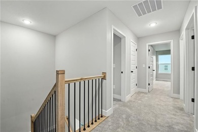 Experience the *Lily*, where modern elegance meets effortless on Golf Club of Creekmoor in Missouri - for sale on GolfHomes.com, golf home, golf lot