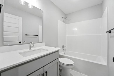 Experience the *Lily*, where modern elegance meets effortless on Golf Club of Creekmoor in Missouri - for sale on GolfHomes.com, golf home, golf lot