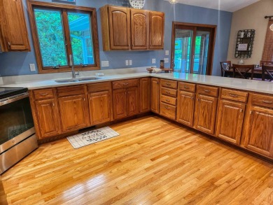 Welcome to this beautiful ranch home set on a generous .78 acre on Lake Carroll Golf Course in Illinois - for sale on GolfHomes.com, golf home, golf lot