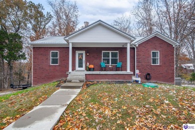 Welcome to 68 Lonnie Lawson Ct located in the gated community of on Doe Valley Country Club in Kentucky - for sale on GolfHomes.com, golf home, golf lot