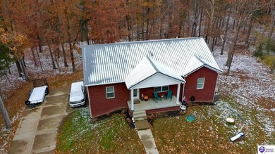 Welcome to 68 Lonnie Lawson Ct located in the gated community of on Doe Valley Country Club in Kentucky - for sale on GolfHomes.com, golf home, golf lot