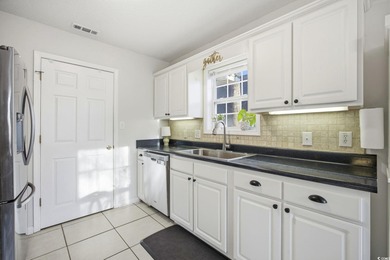 Welcome home to this warm and inviting 4-bedroom, 2-bath home on Palmetto Greens Golf and Country Club in South Carolina - for sale on GolfHomes.com, golf home, golf lot