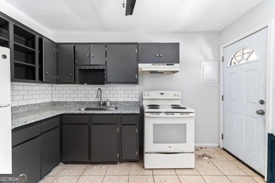 Great income generating investment property in the up and coming on East Lake Golf Club in Georgia - for sale on GolfHomes.com, golf home, golf lot