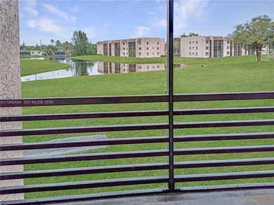 Motivated Seller! Enjoy stunning golf course and lake views from on Sunrise Lakes Phase IV Golf Course in Florida - for sale on GolfHomes.com, golf home, golf lot