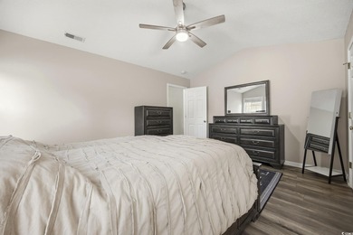 Welcome home to this warm and inviting 4-bedroom, 2-bath home on Palmetto Greens Golf and Country Club in South Carolina - for sale on GolfHomes.com, golf home, golf lot