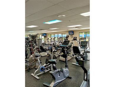 Motivated Seller! Enjoy stunning golf course and lake views from on Sunrise Lakes Phase IV Golf Course in Florida - for sale on GolfHomes.com, golf home, golf lot