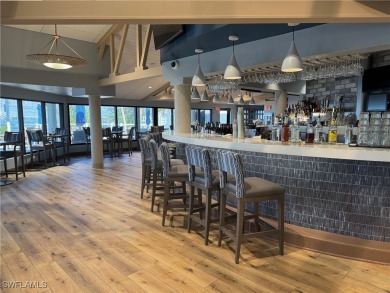 Spacious 2-bedroom top-floor unit with great view over the lake on The Landings Yacht, Golf and Tennis Club in Florida - for sale on GolfHomes.com, golf home, golf lot