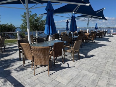 Spacious 2-bedroom top-floor unit with great view over the lake on The Landings Yacht, Golf and Tennis Club in Florida - for sale on GolfHomes.com, golf home, golf lot
