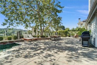Experience luxury living in this beautifully upgraded 5-bedroom on  in California - for sale on GolfHomes.com, golf home, golf lot