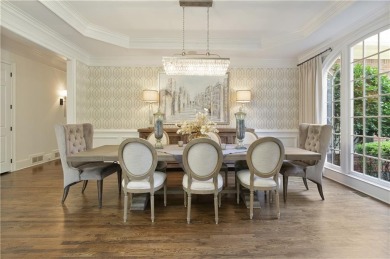 Exquisite and beautifully updated home nestled in the exclusive on The Golf Club of Georgia in Georgia - for sale on GolfHomes.com, golf home, golf lot