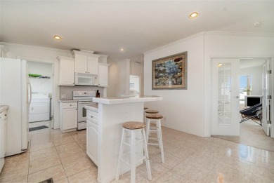 Stilt home in Windmill village, 3 bedrooms, or 2 bedrooms and on Saint Andrews South Golf Club in Florida - for sale on GolfHomes.com, golf home, golf lot