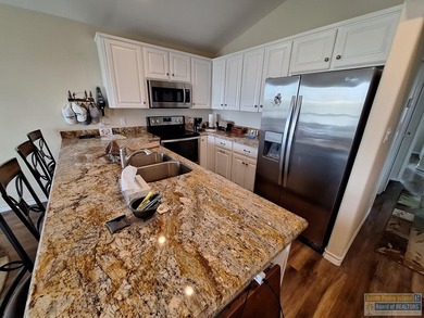 Beautiful custom home located on the resort golf course. Great on Long Island Golf Course in Texas - for sale on GolfHomes.com, golf home, golf lot