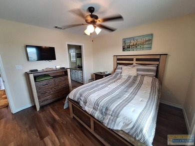 Beautiful custom home located on the resort golf course. Great on Long Island Golf Course in Texas - for sale on GolfHomes.com, golf home, golf lot